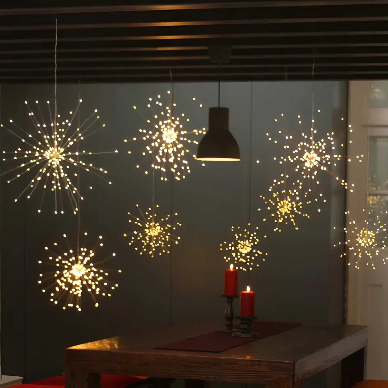 Solar-powered firework style LED meteor shower light hanging outdoors