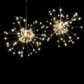 Solar-powered firework style LED meteor shower light hanging outdoors