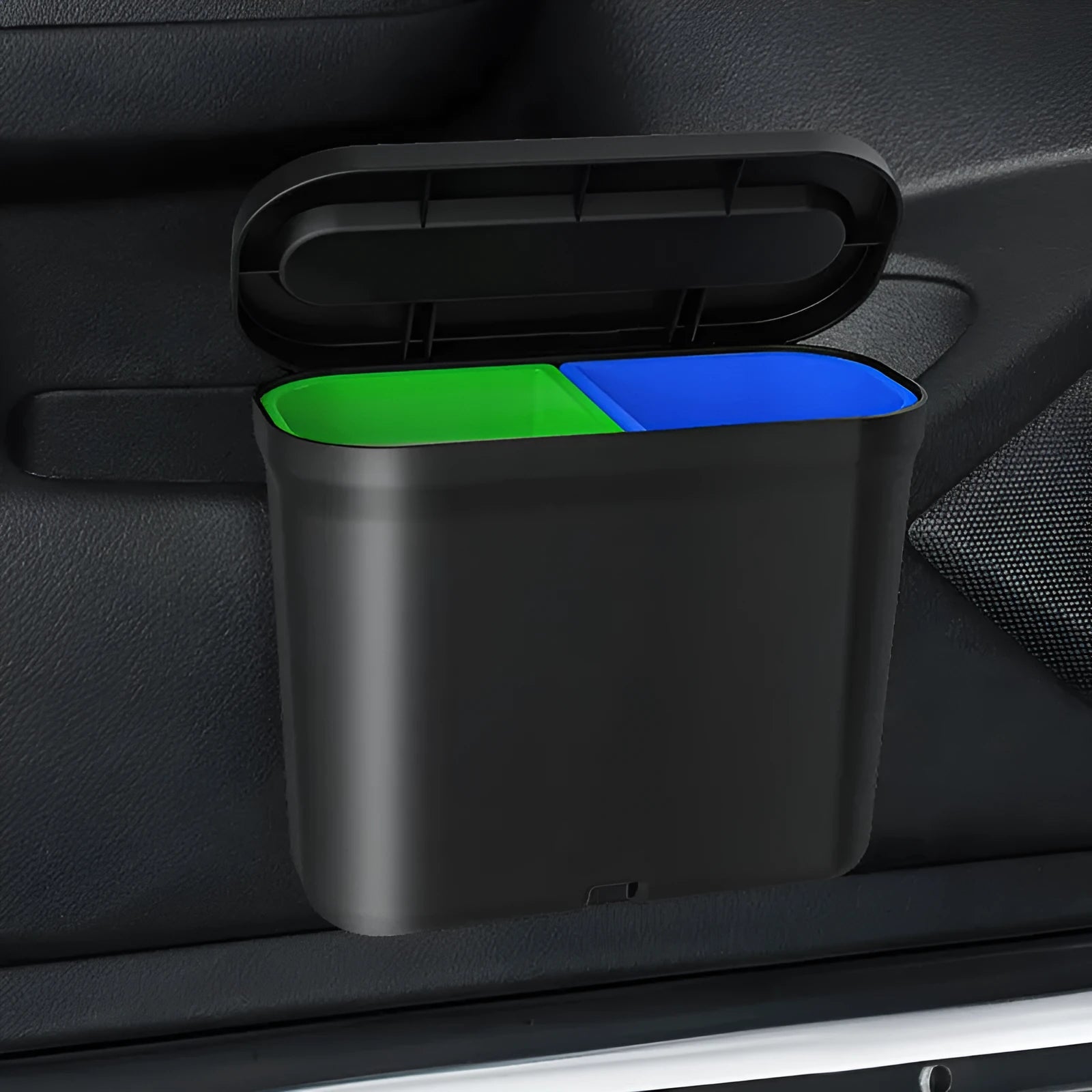 Black 1.7L PP plastic car trash can suspended on centre console with lid open, interior visible