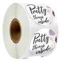 Round kraft paper sticker labels in two sizes on a roll, holiday decoration gift series with styles A B C D