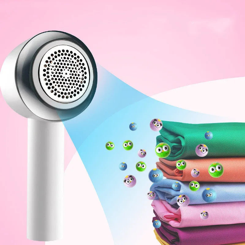 White rechargeable fabric shaver and beater for removing bobbles from jumpers