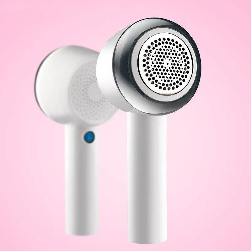 White rechargeable fabric shaver and beater for removing bobbles from jumpers