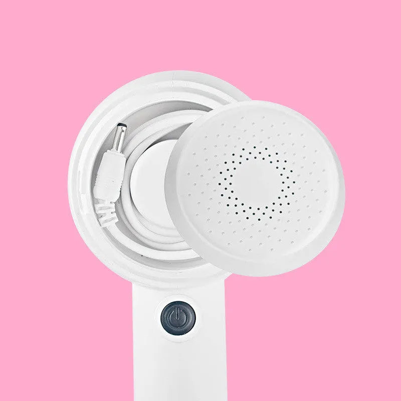 White rechargeable fabric shaver and beater for removing bobbles from jumpers