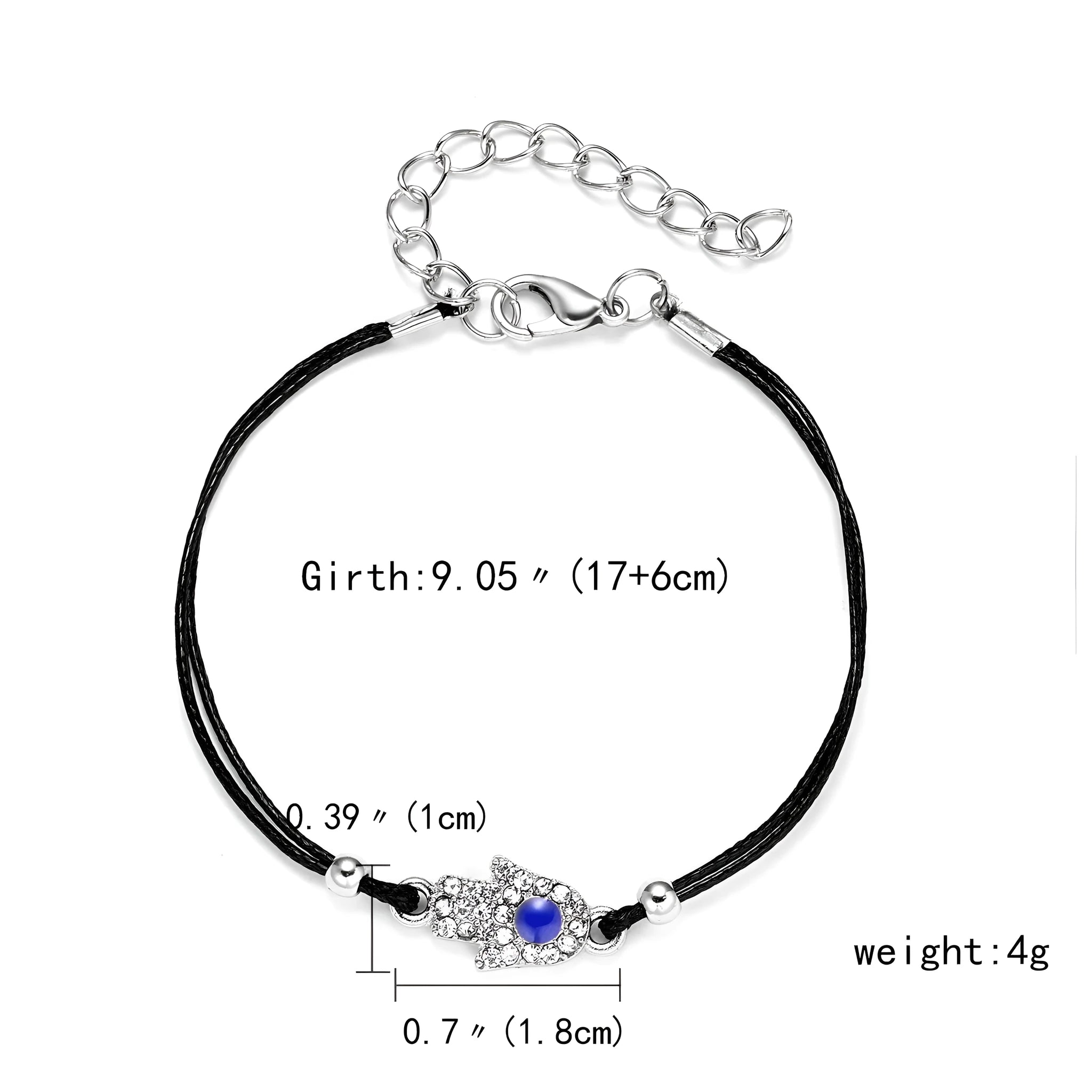 Handmade black string bracelet with evil eye charm and blue beads on a white background
