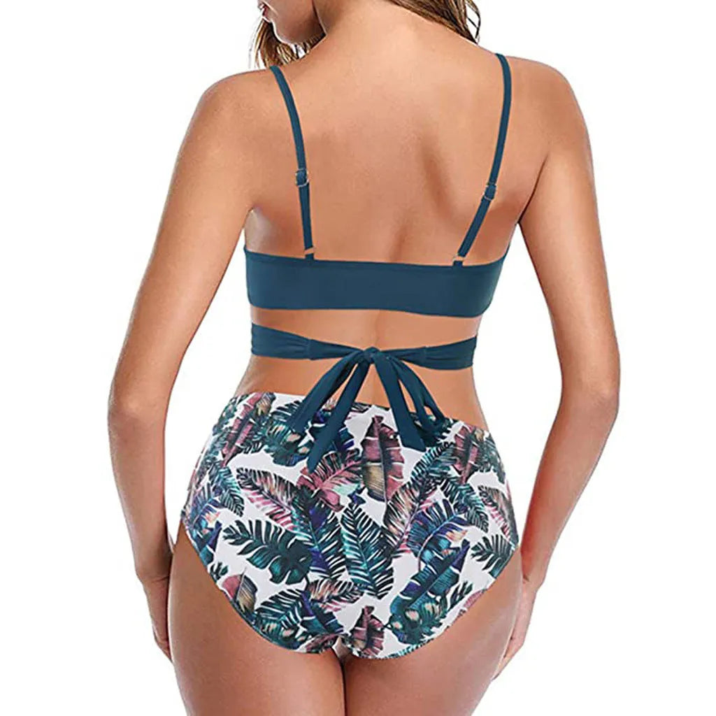 Women's solid print bikini set with push-up top and matching bottoms, leopard pattern, on a white background