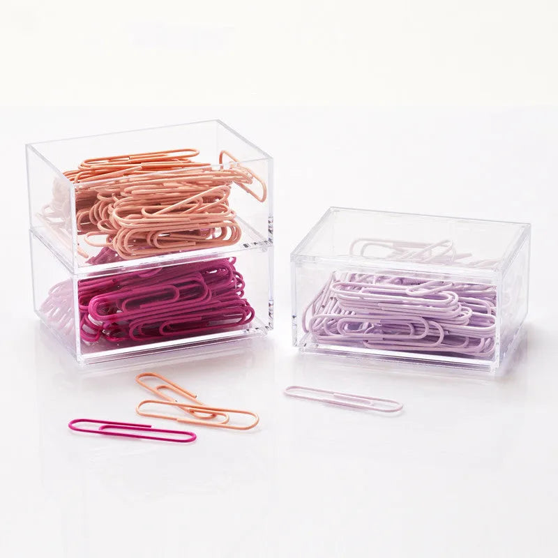 Mint green PVC coated metal paper clips in 28mm and 50mm sizes on white background