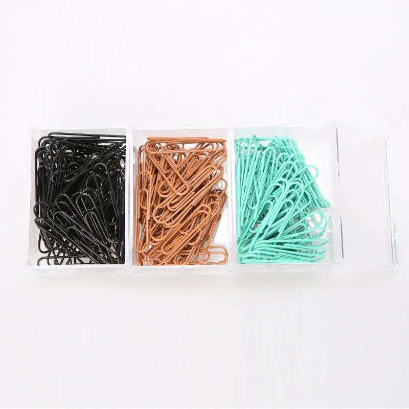 Mint green PVC coated metal paper clips in 28mm and 50mm sizes on white background
