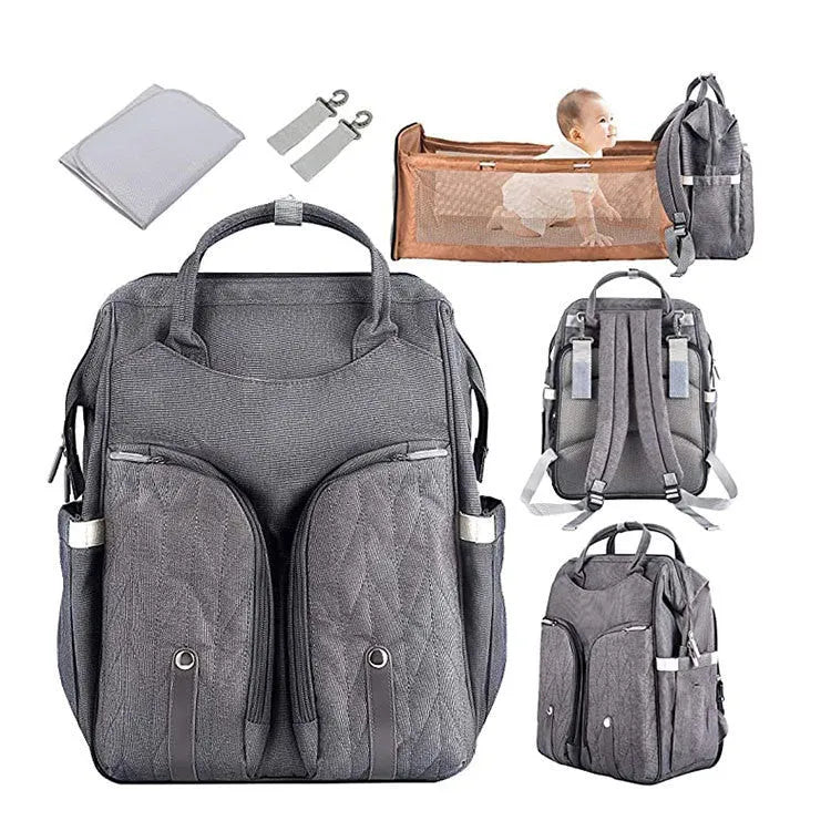 Large shell-shaped polyester mummy bag in black with three shoulder straps and soft handle