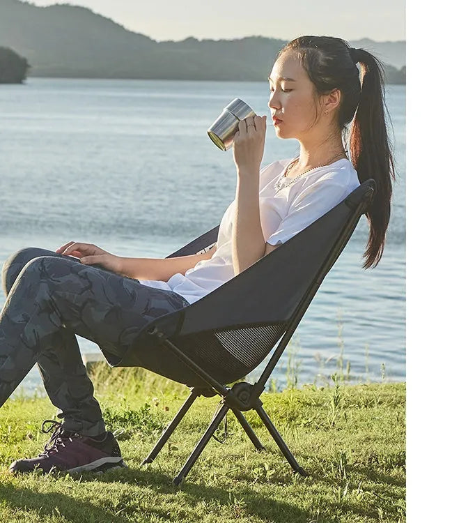 Ultralight folding camping chair in blue with iron frame and 600D Oxford cloth seat, folded for storage