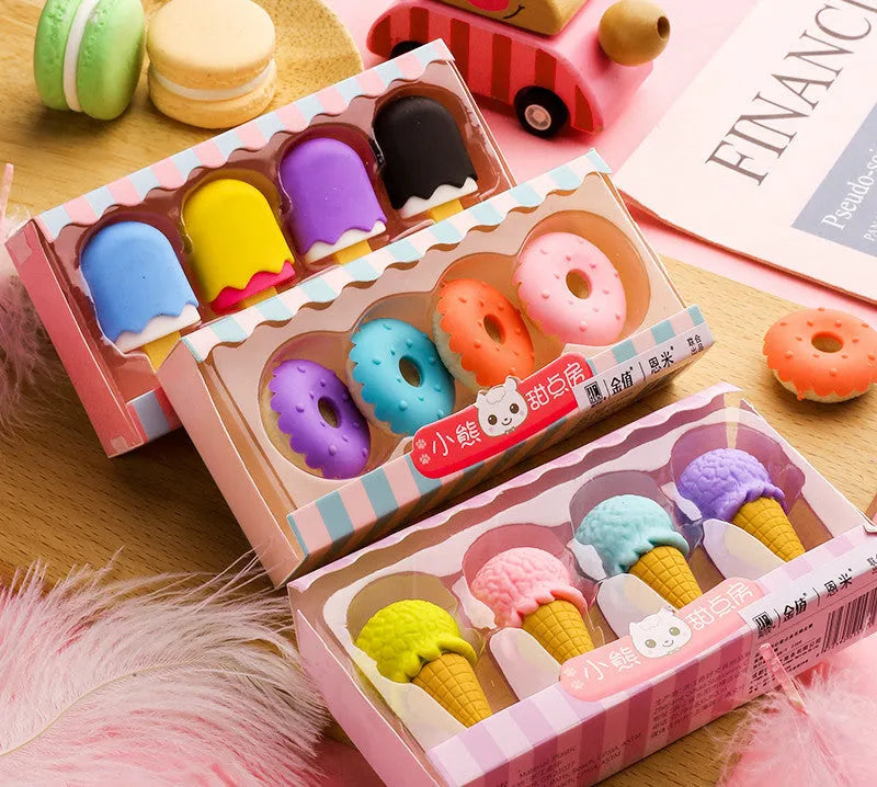 Set of 12 colourful cartoon food erasers including ice cream cones, donuts, and lollipops for children