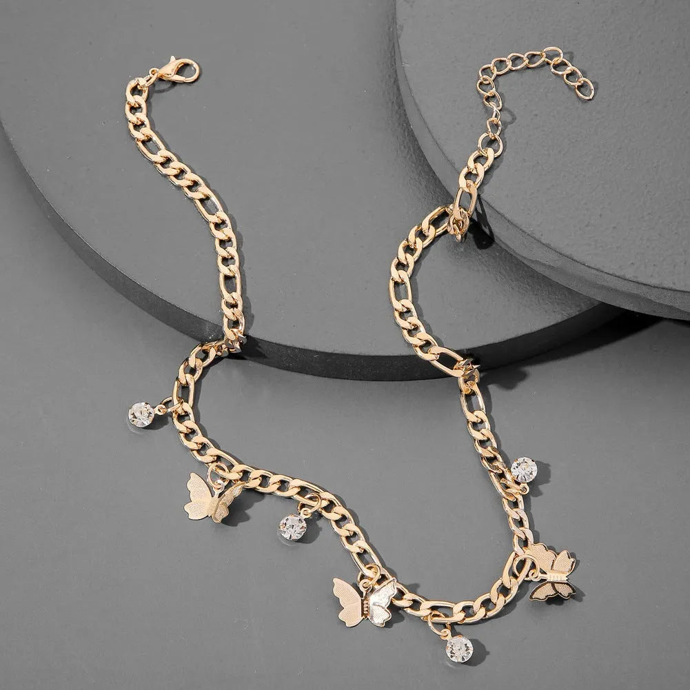 Butterfly necklace in gold or silver alloy with 40cm chain, 5cm extension, and unisex clavicle design.