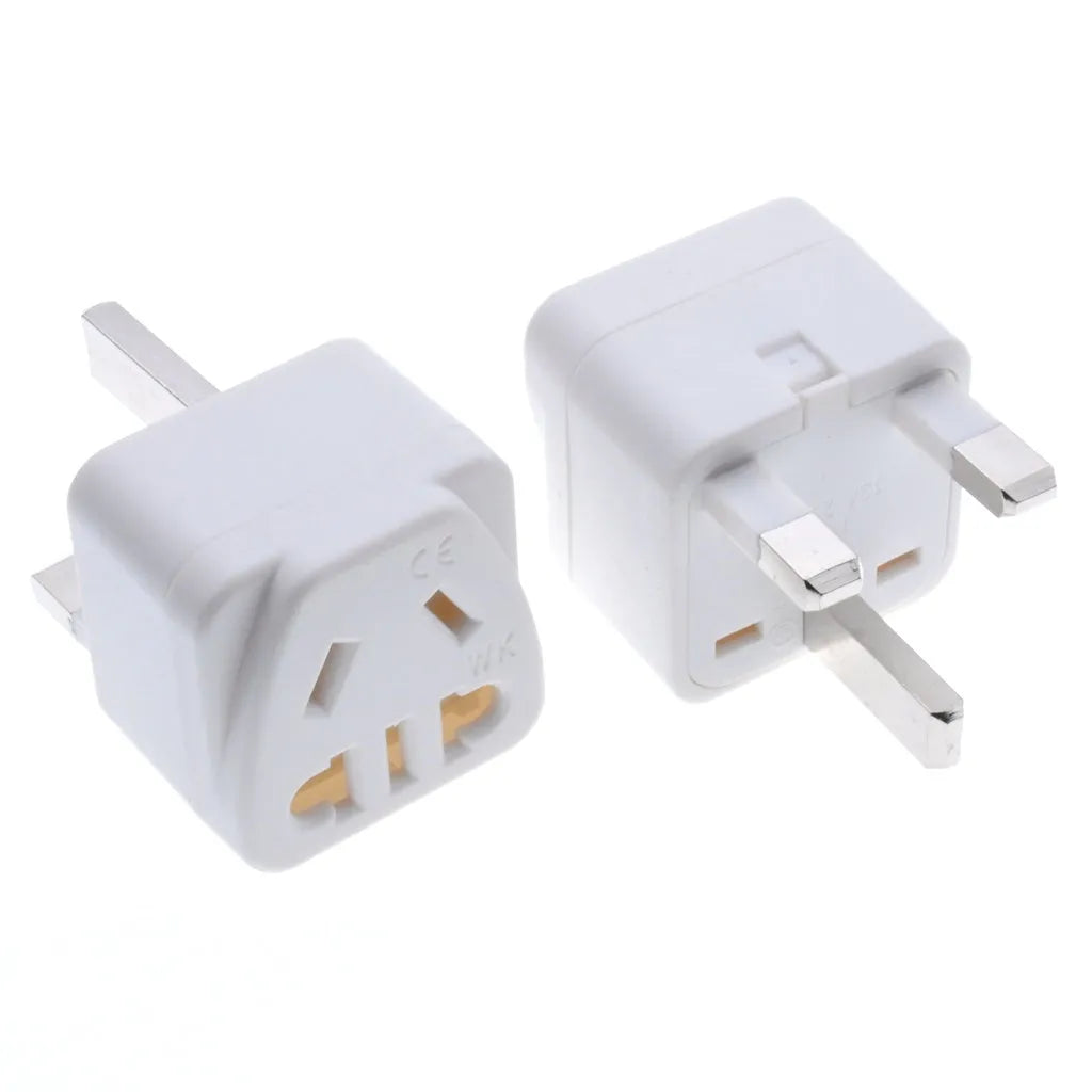 Square white international power adapter with five output sockets and a three-pin plug