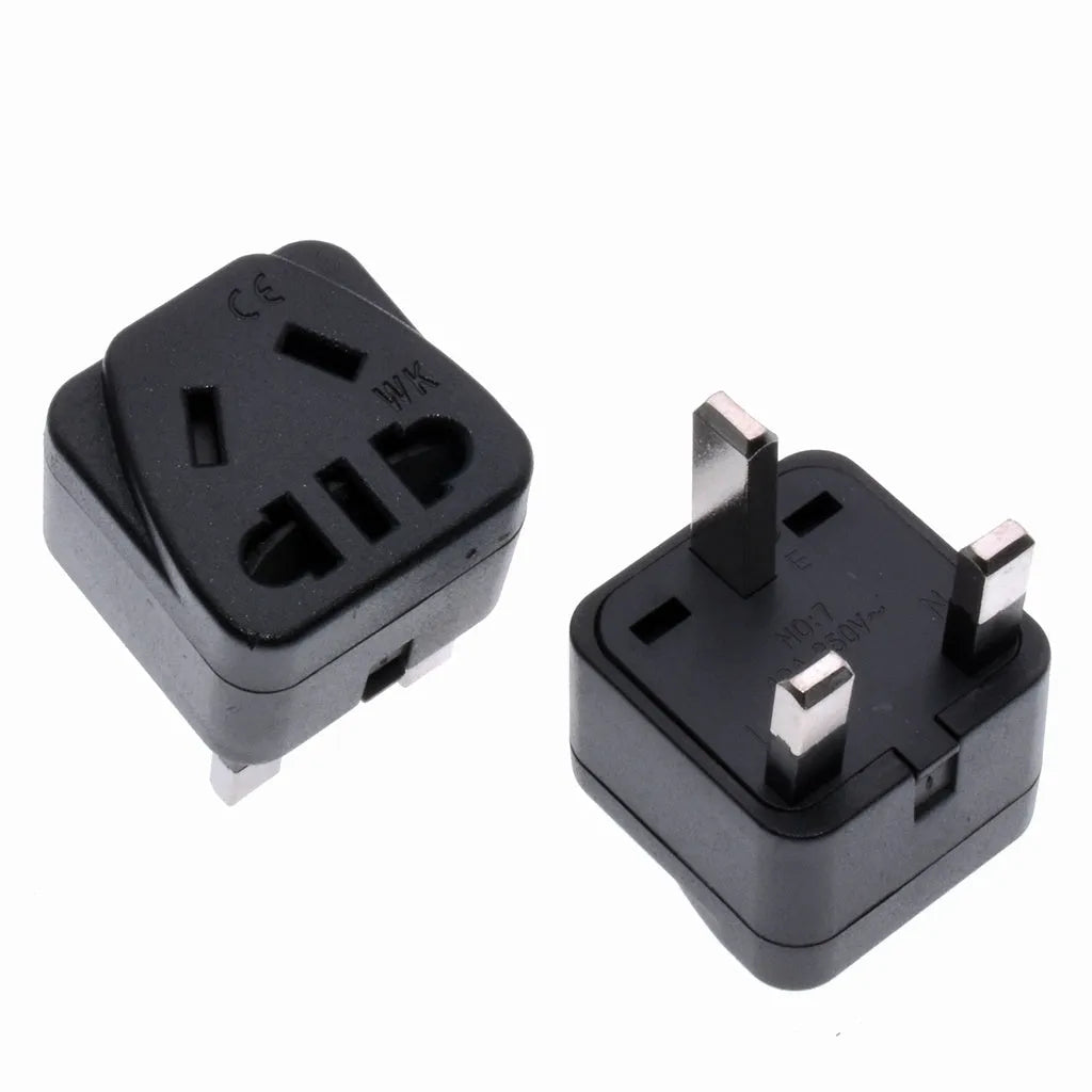 Square white international power adapter with five output sockets and a three-pin plug