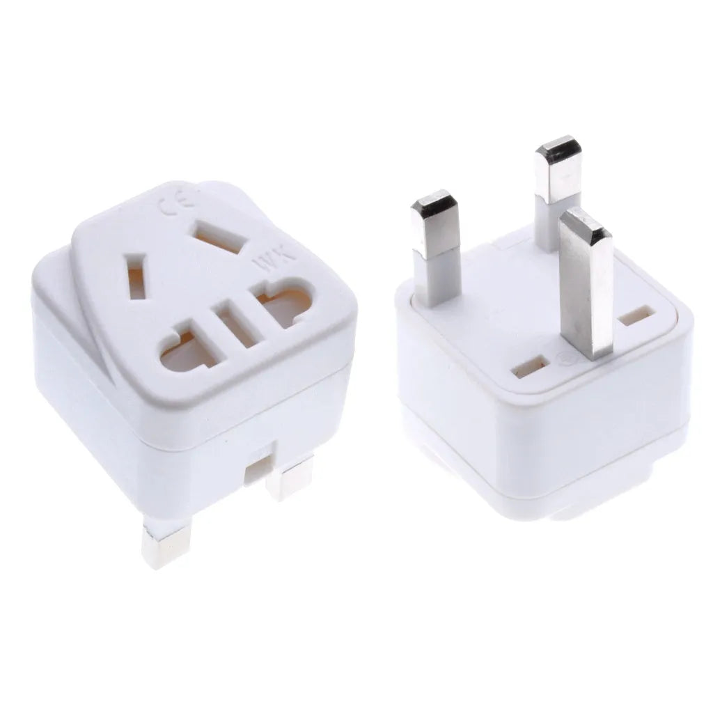 Square white international power adapter with five output sockets and a three-pin plug