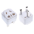 Square white international power adapter with five output sockets and a three-pin plug