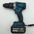 21V black and orange cordless impact drill with lithium battery on a workbench with drill bits