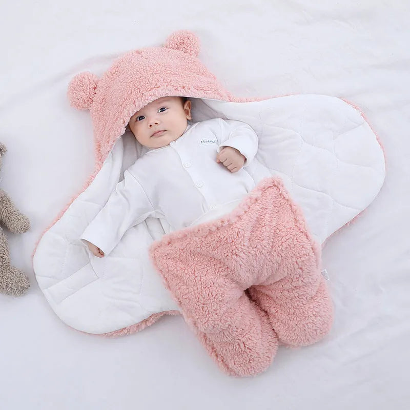 Cotton blend baby quilted sleeping bag wrapper shown in light blue, with size and colour options displayed.
