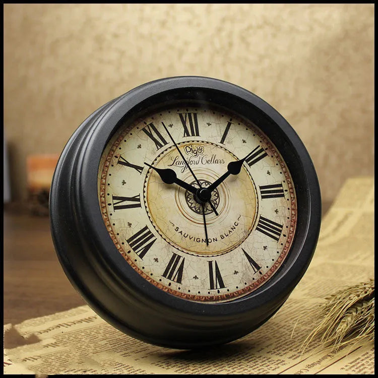 Round 6-inch European retro desk alarm clock with a plastic shell and pointer display.