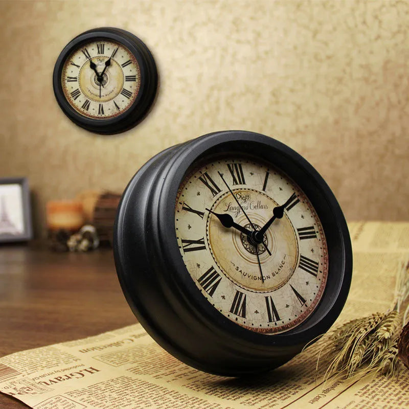 Round 6-inch European retro desk alarm clock with a plastic shell and pointer display.