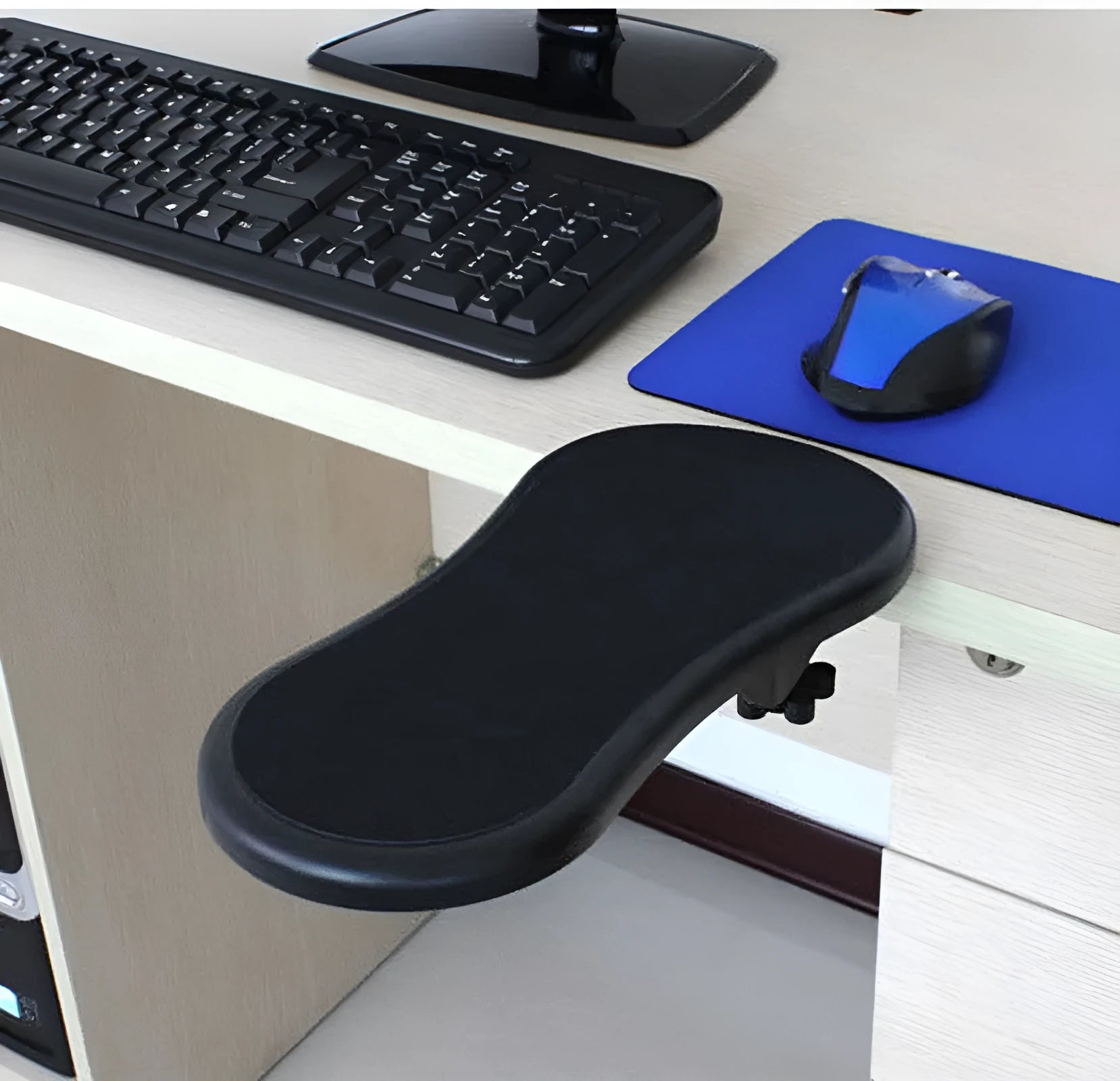 Small black rotating computer mouse wrist pad bracket showing 180-degree adjustment capability