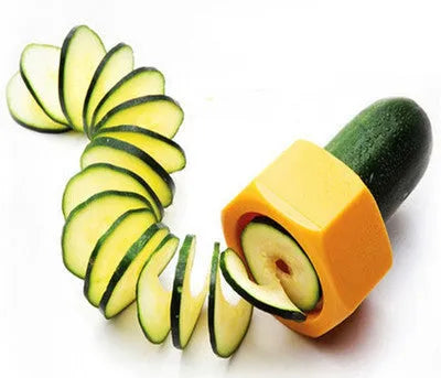 Yellow and green plastic spiral vegetable cutter for kitchen use.