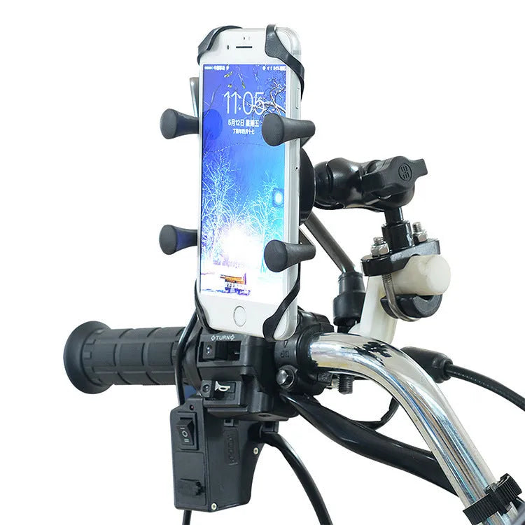 Black aluminium alloy motorcycle phone mount attached to a bike handlebar holding a mobile phone.