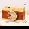 Camera-shaped wooden music box with rotating mechanism in pine construction