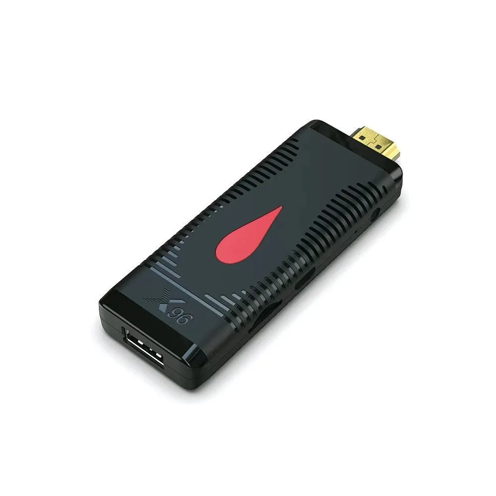 Smart TV set-top box dongle with remote, cable, and EU/UK/US power adapters on a white background.