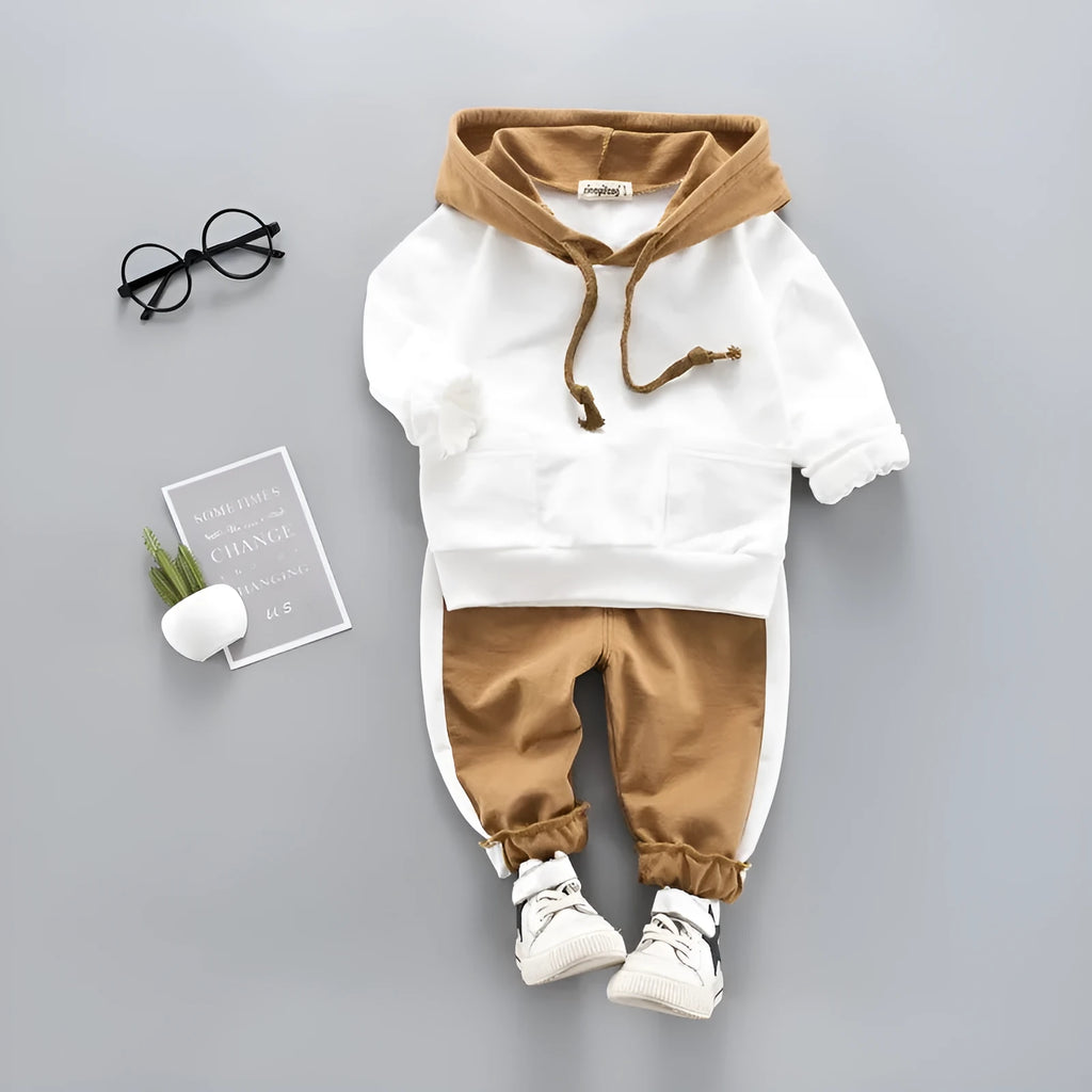 Child's blue two-piece hooded tracksuit set with top and trousers on white background