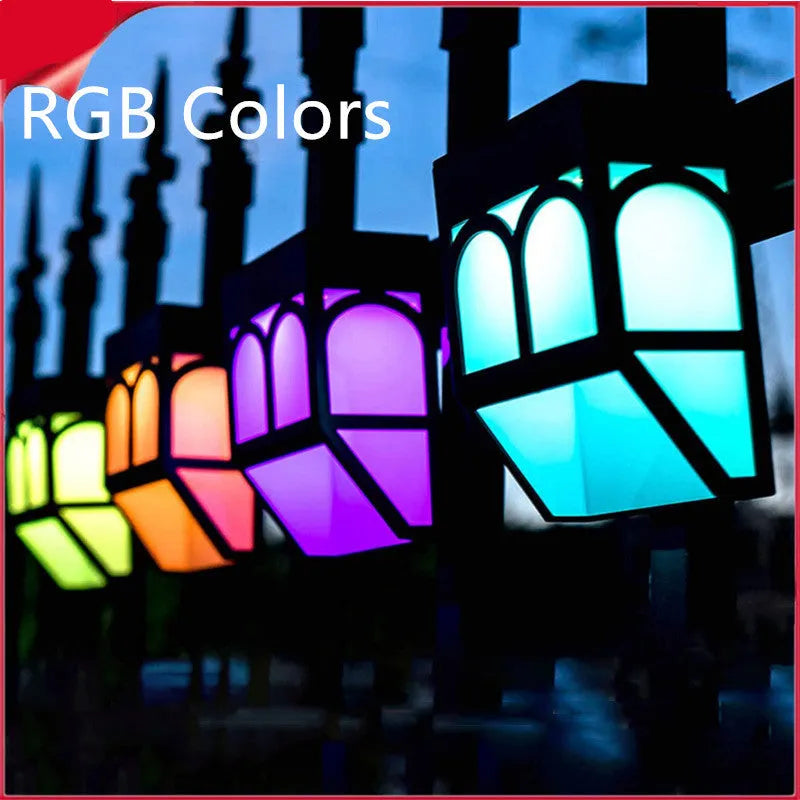 Solar wall lamp mounted on outdoor fence with IP67 waterproof rating and compact 90x122mm dimensions