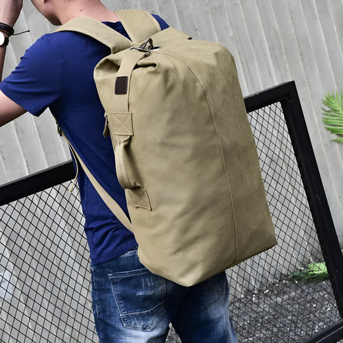 Canvas outdoor climbing backpack in khaki large size with double shoulder straps and car-suture detailing