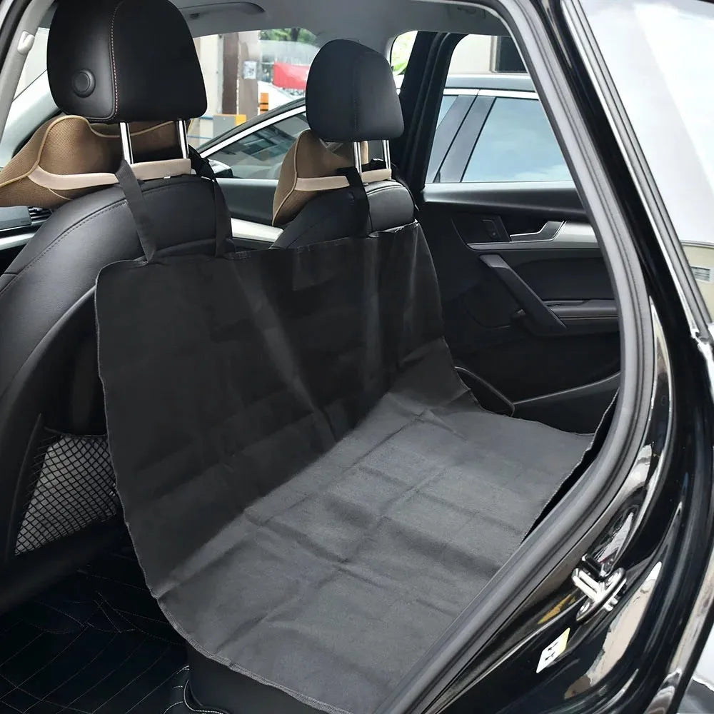 Waterproof dog kennel mat in black made from 600D Oxford cloth for car rear seat protection.