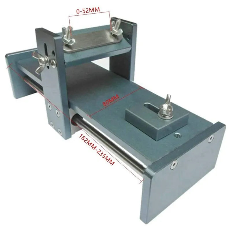 Fixed angle sharpening tool for woodworking chisels and carving knives on a workbench.