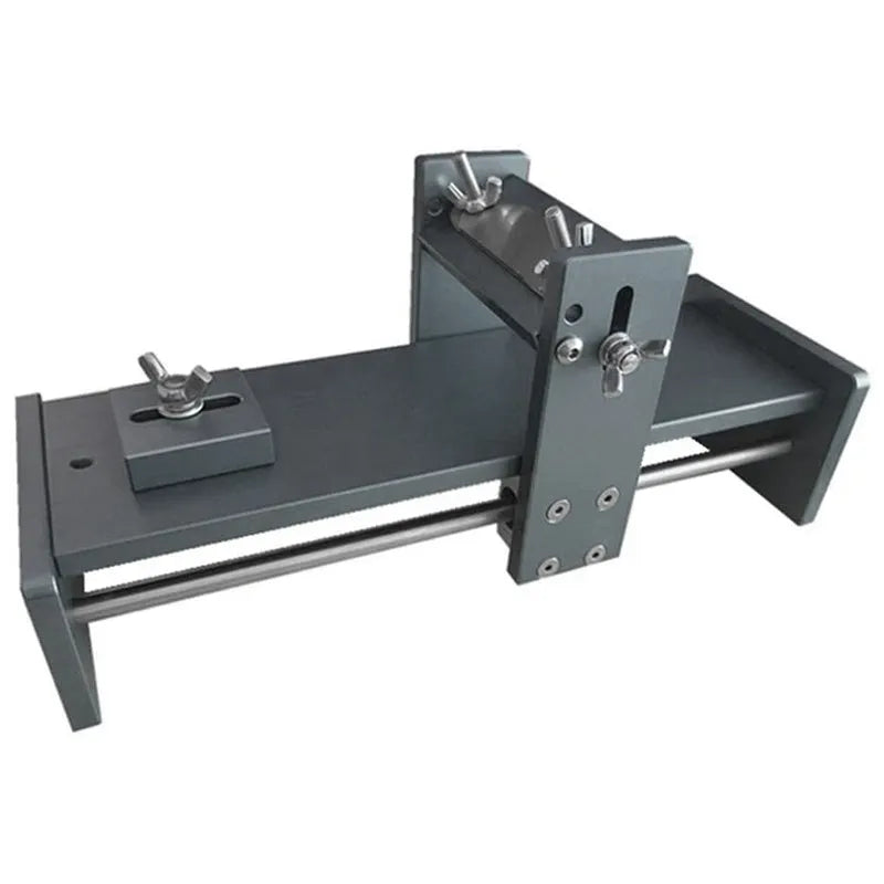 Fixed angle sharpening tool for woodworking chisels and carving knives on a workbench.