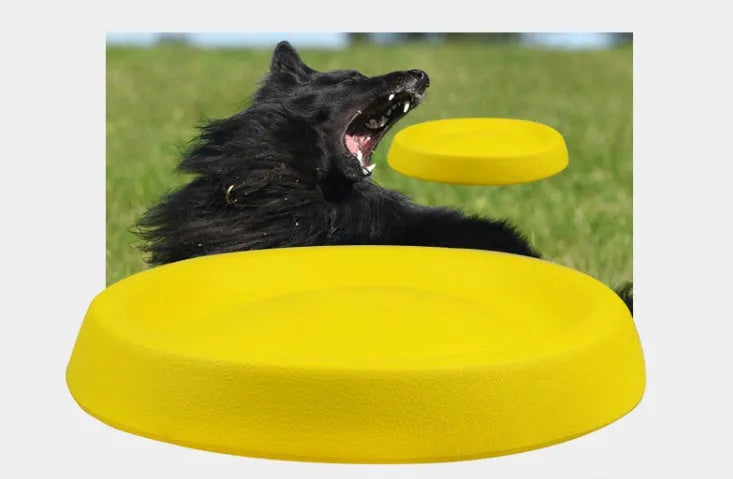 Yellow EVA plastic dog throwing toy for fetch games and training.