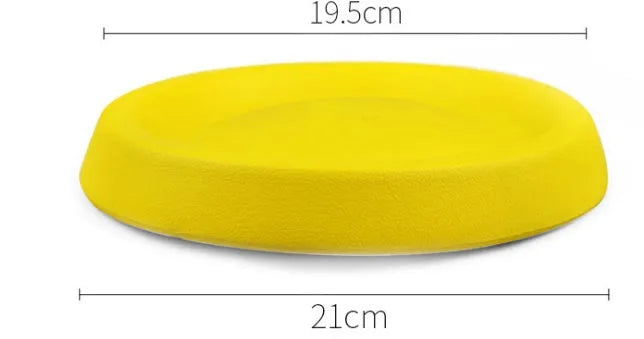 Yellow EVA plastic dog throwing toy for fetch games and training.