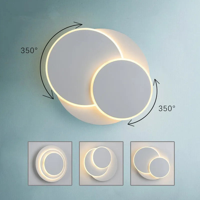 Modern round acrylic wall lamp in black or white, shown in three different sizes.