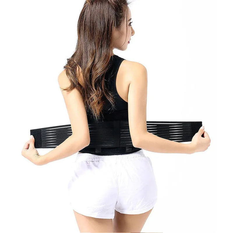 Black self-heating magnetic waist support belt fastened around a waist, showing adjustable straps and elastic cloth material.