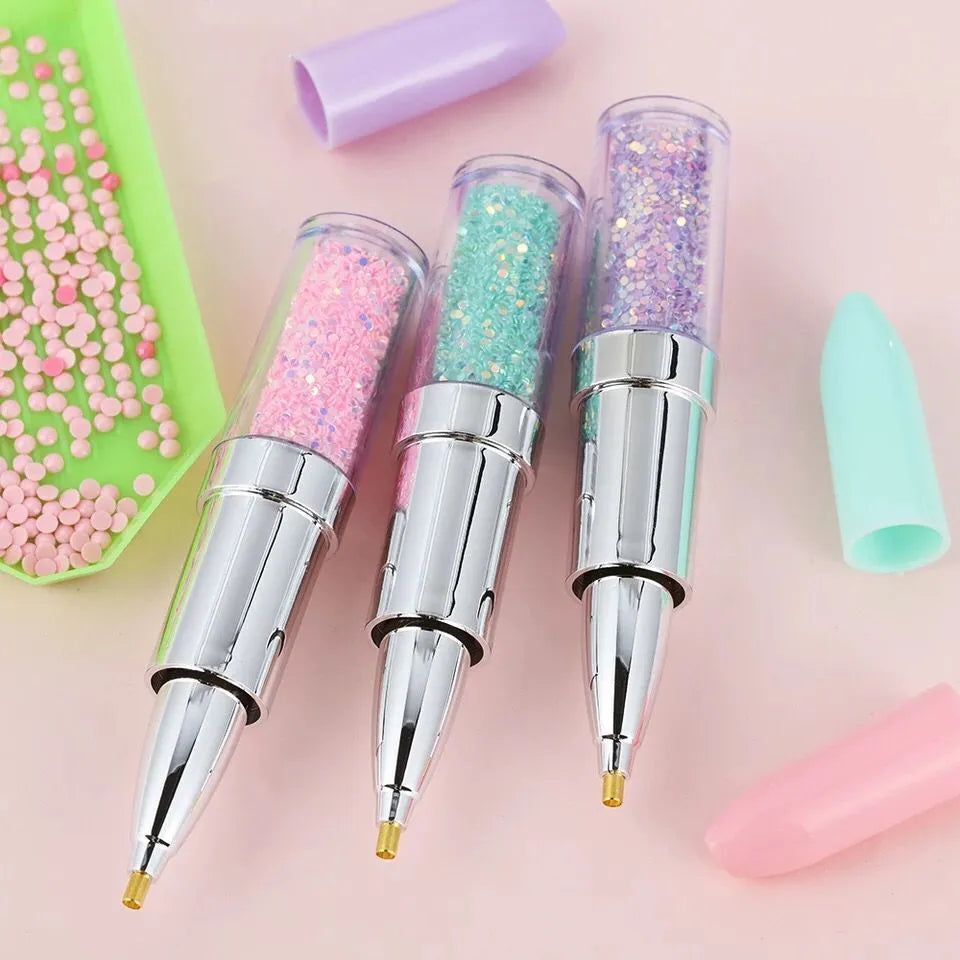 Plastic diamond painting point drill pen tool in pink, purple or green for 5D diamond embroidery and cross stitch.