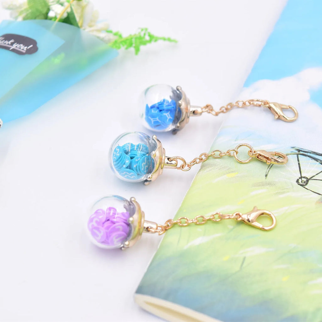 Twelve Constellations black gel pen with 0.5mm tip and 16cm plastic body, zodiac pendant, random colour
