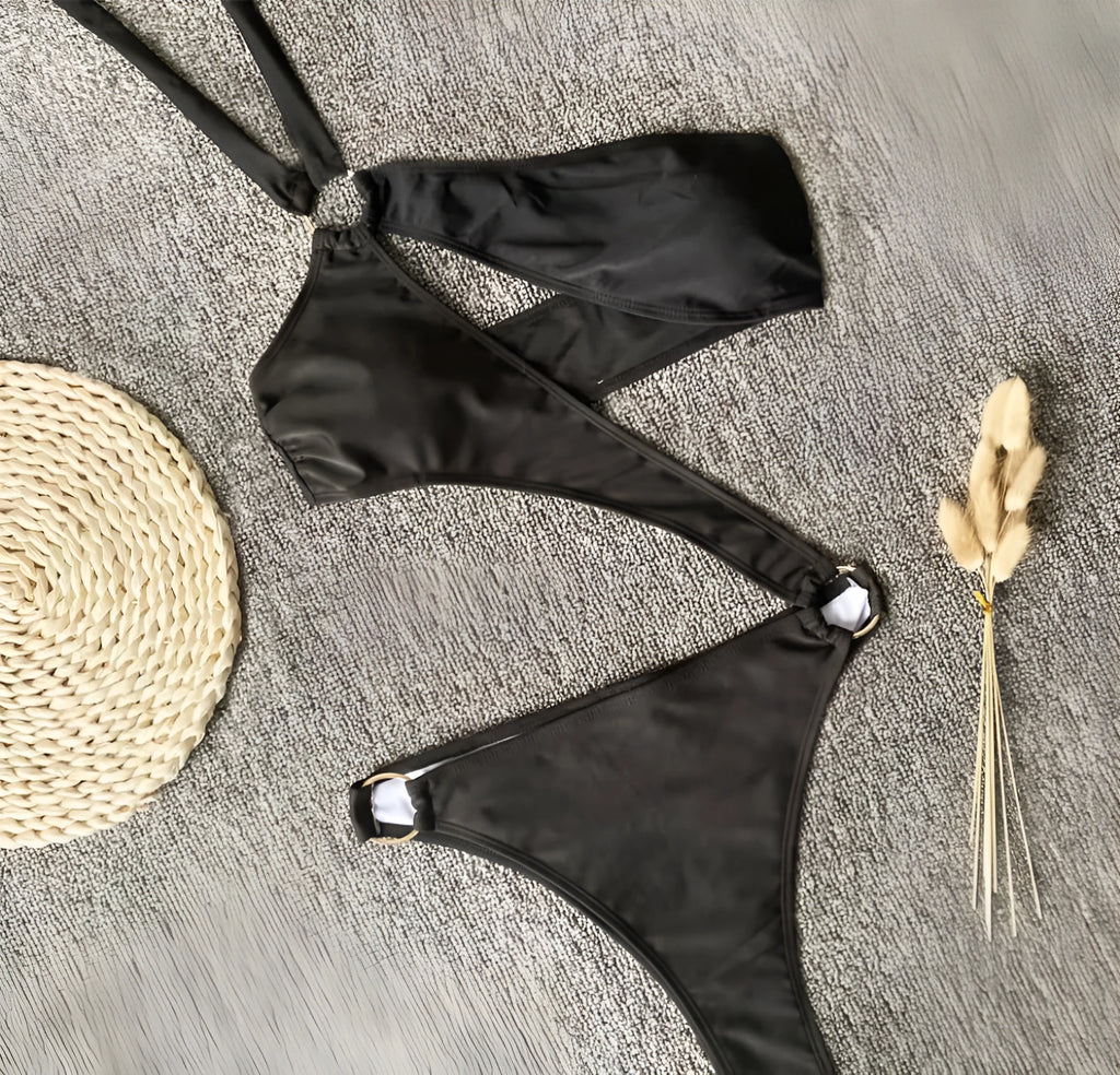 Women's one-piece bikini swimsuit with hollow out design and steel support, black or white, sizes S M L