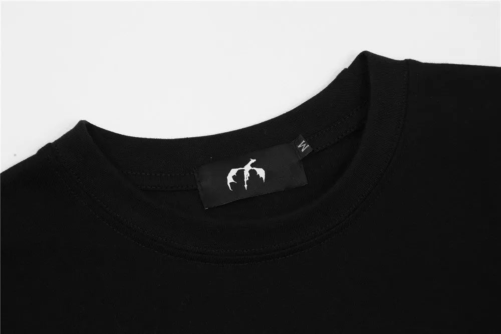 Loose-fit round neck short sleeve t-shirt with demon spoof pattern in black