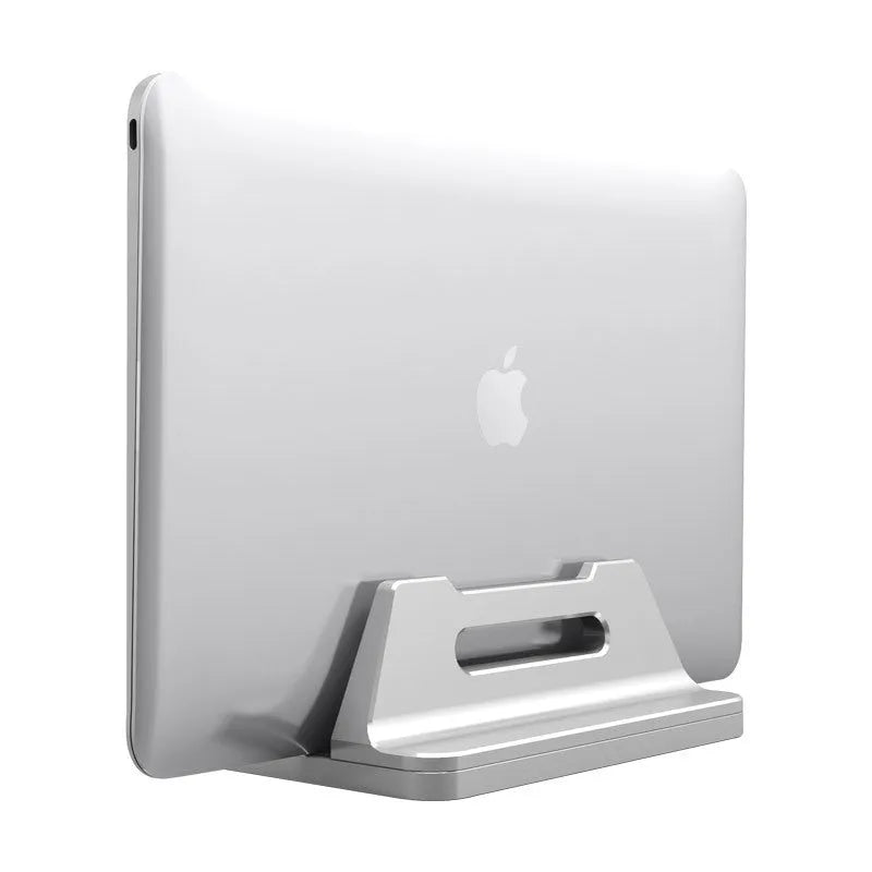 Silver aluminium alloy vertical notebook storage bracket on desk holding a laptop upright