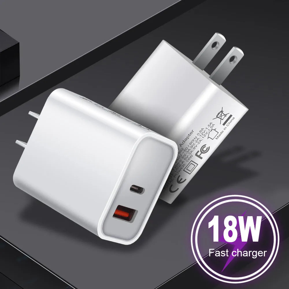 White 18W fast charger with dual USB ports and international plug options