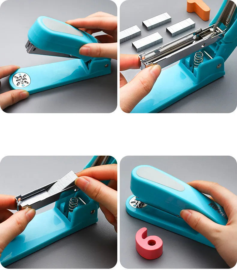 Black 360-degree rotatable stapler on a stack of A4 paper, showing its rotating head mechanism.