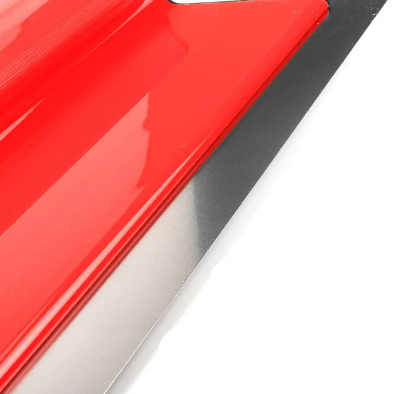 Grey handle leveling scraper tool with a long 40cm steel blade for wall preparation.