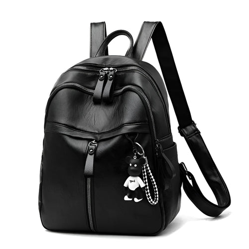 Black soft surface PU leather backpack showing medium size with shoulder straps and luggage strap attachment