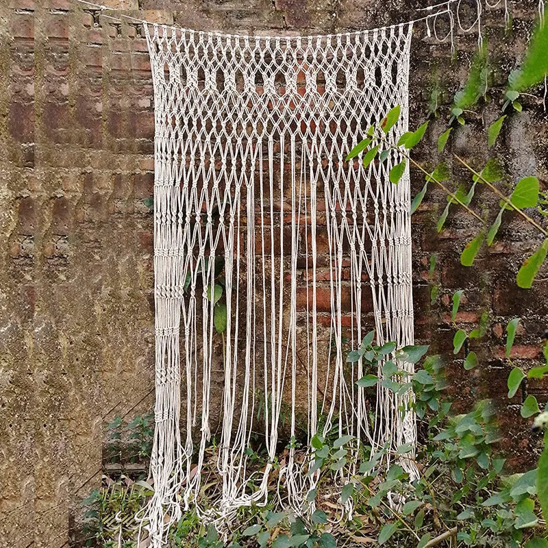 White perforated Nordic woven partition curtain with tassel detail, shown for doorway or window use, 90cm width