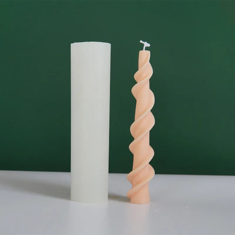 Handmade spiral lace rod silicone candle mould for creating textured decorative candles.
