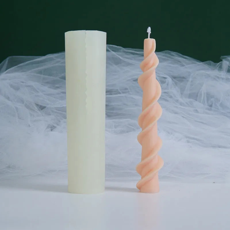 Handmade spiral lace rod silicone candle mould for creating textured decorative candles.